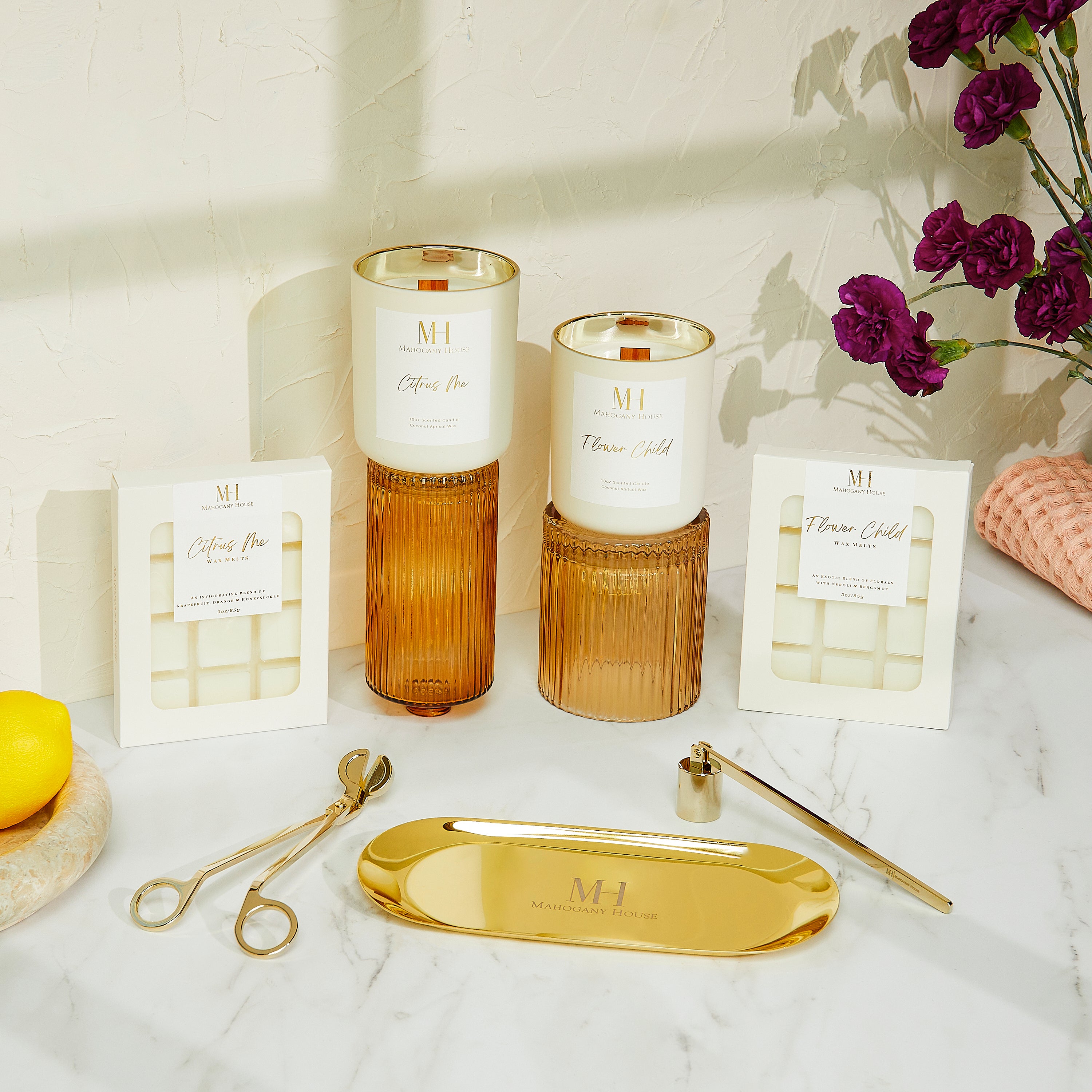 Gold candle care kit with snuffer, wick trimmer, and holder plate