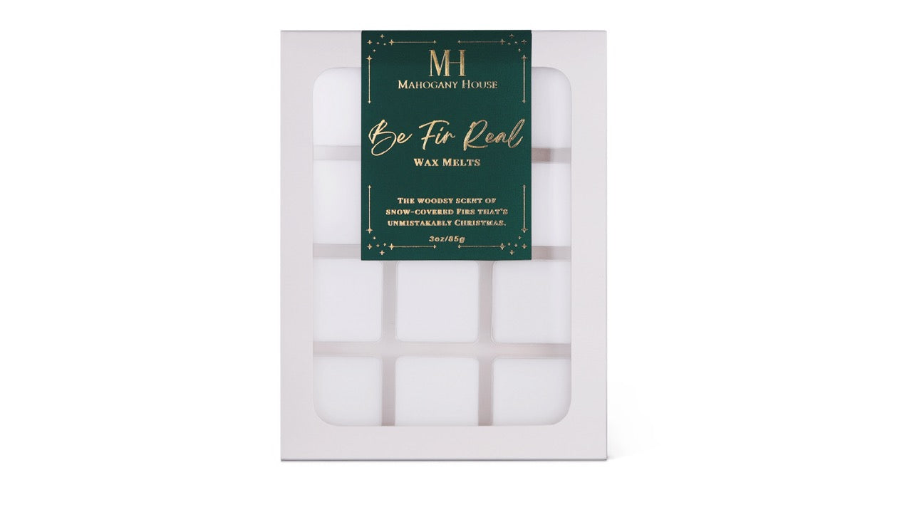 Mahogany House Be Fir Real wax melts with balsam fir, cedar, and juniper in green holiday packaging on white background.