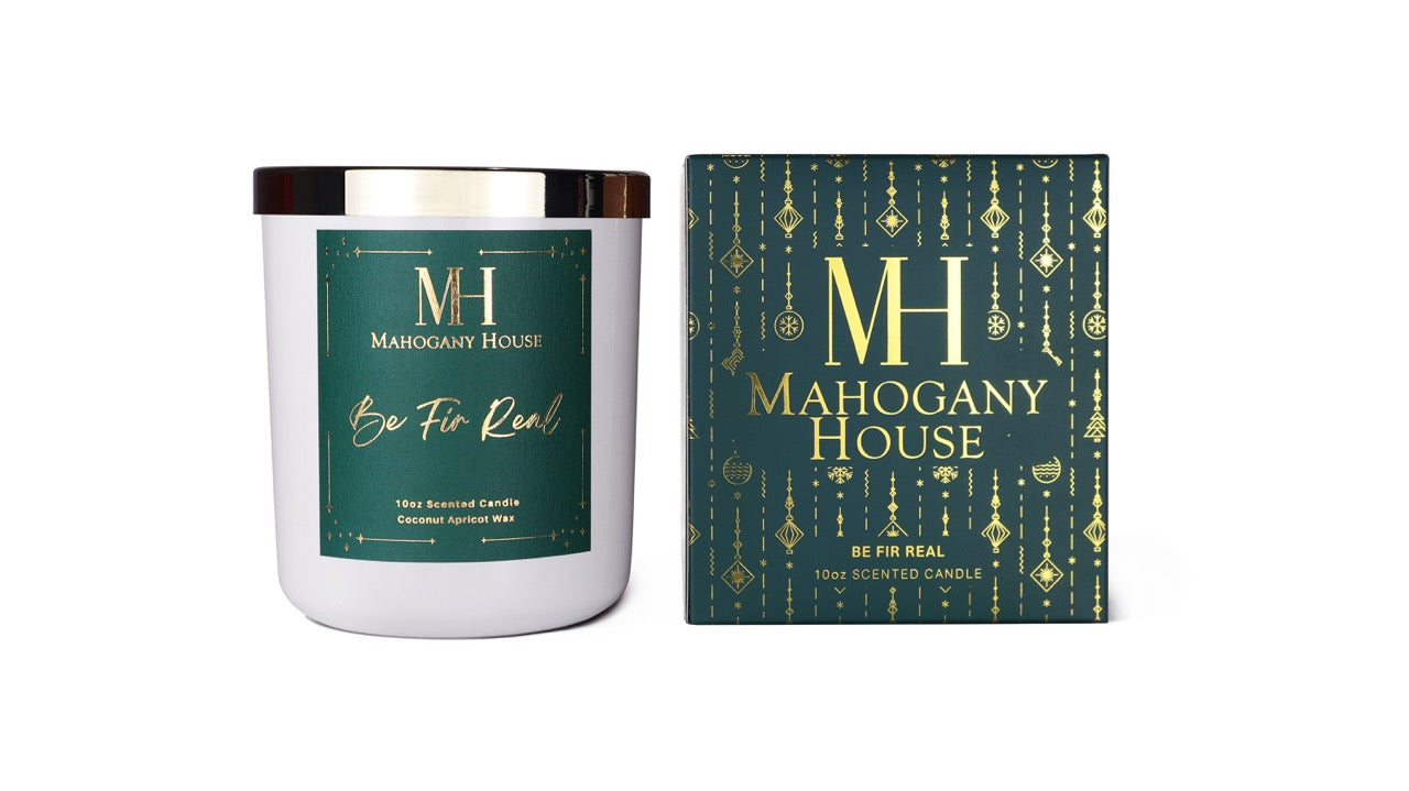 Candle and packaging of Mahogany House Be Fir Real Candle  on a white background