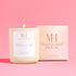 Flower Child votive candle in white glass vessel with Mahogany House packaging.